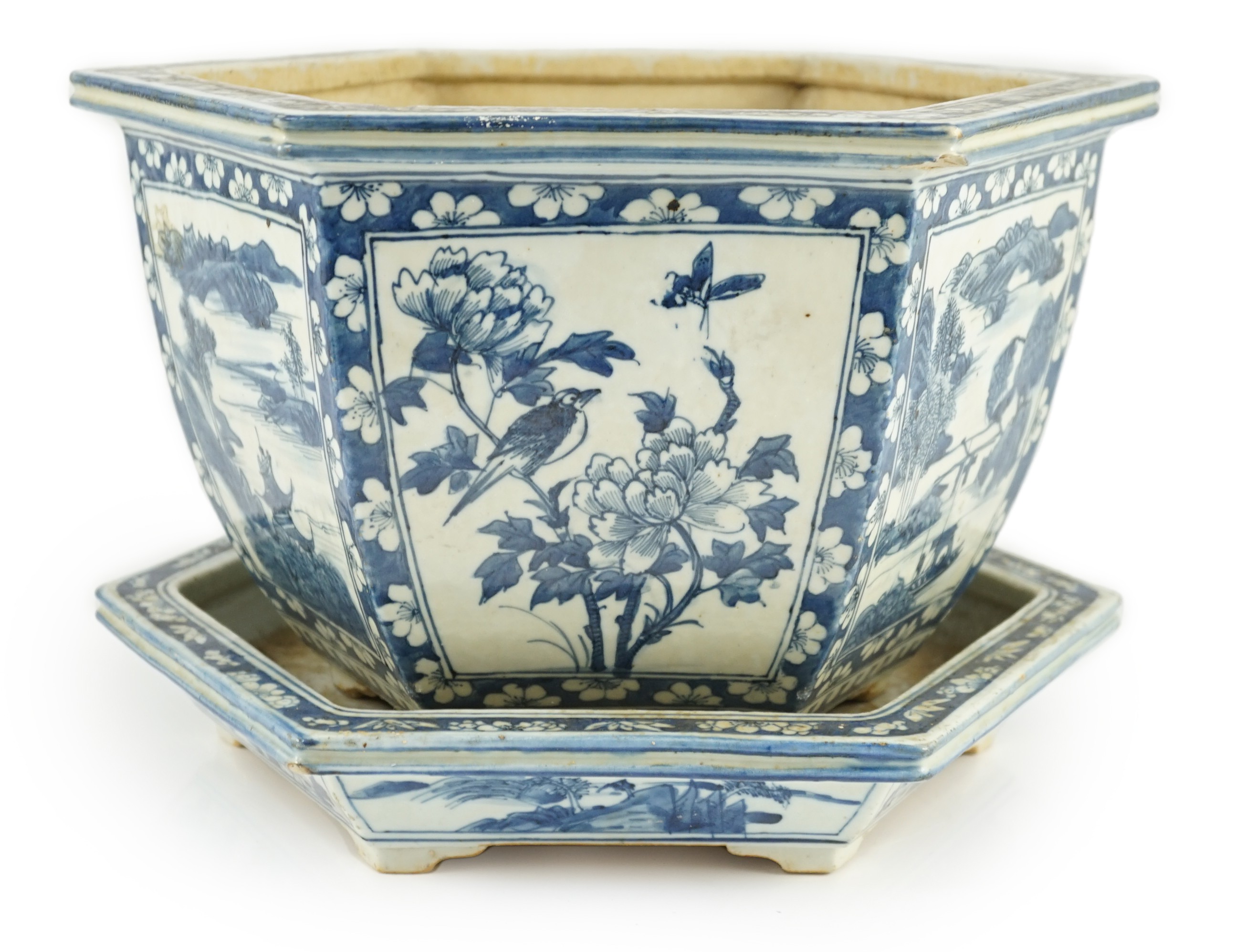 A Chinese hexagonal blue and white planter and underdish, 19th century, 35cm wide, two rim chips